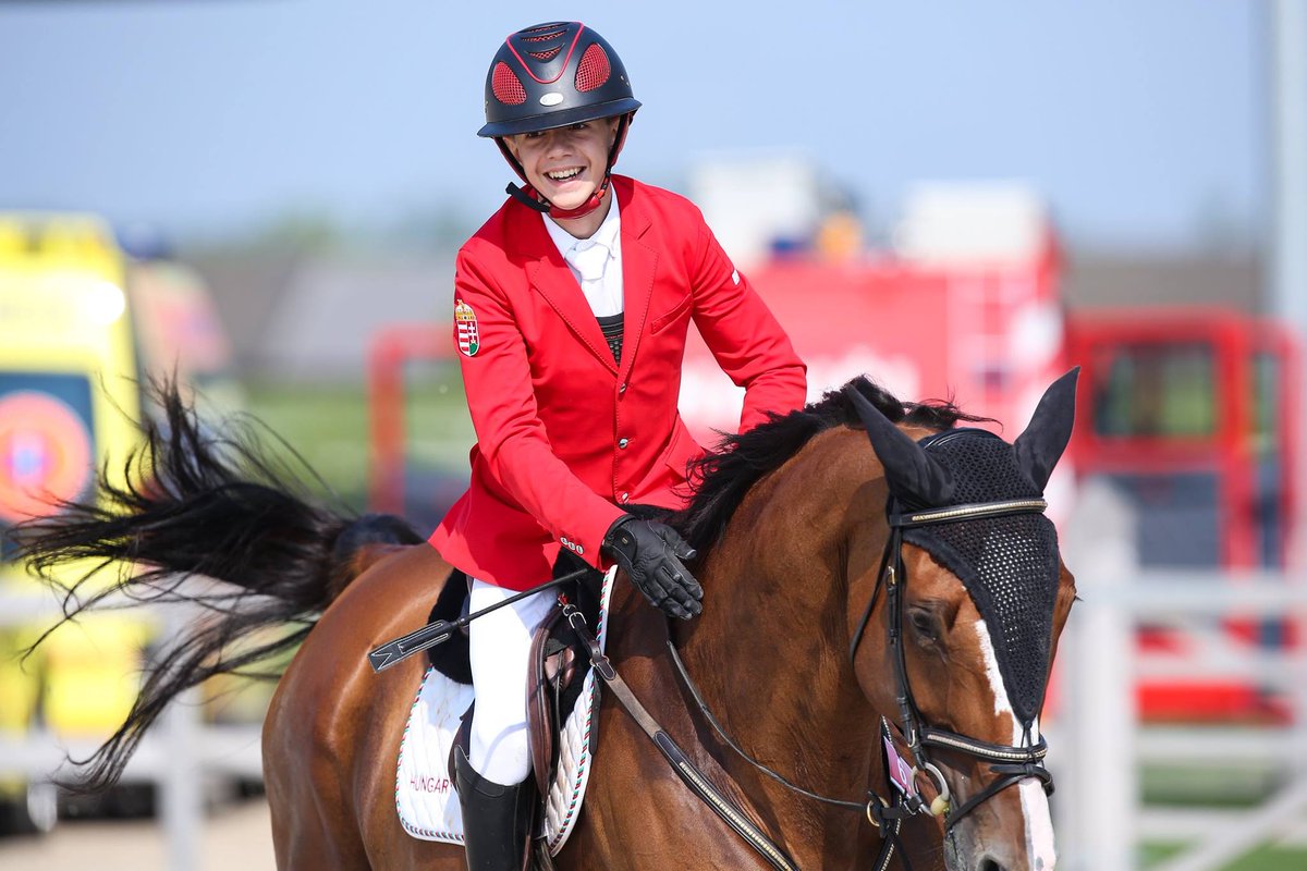 xbionicsphere's tweet photo. Talk about starting the day with a bang! 💥 Team Hungary 🇭🇺 rode to victory in the second round of the 1.25m Prize Respect CSIO Children’s FEI Jumping Nations Cup™!! #congratulations #showjumping #samorin https://t.co/BmuG3yahLX