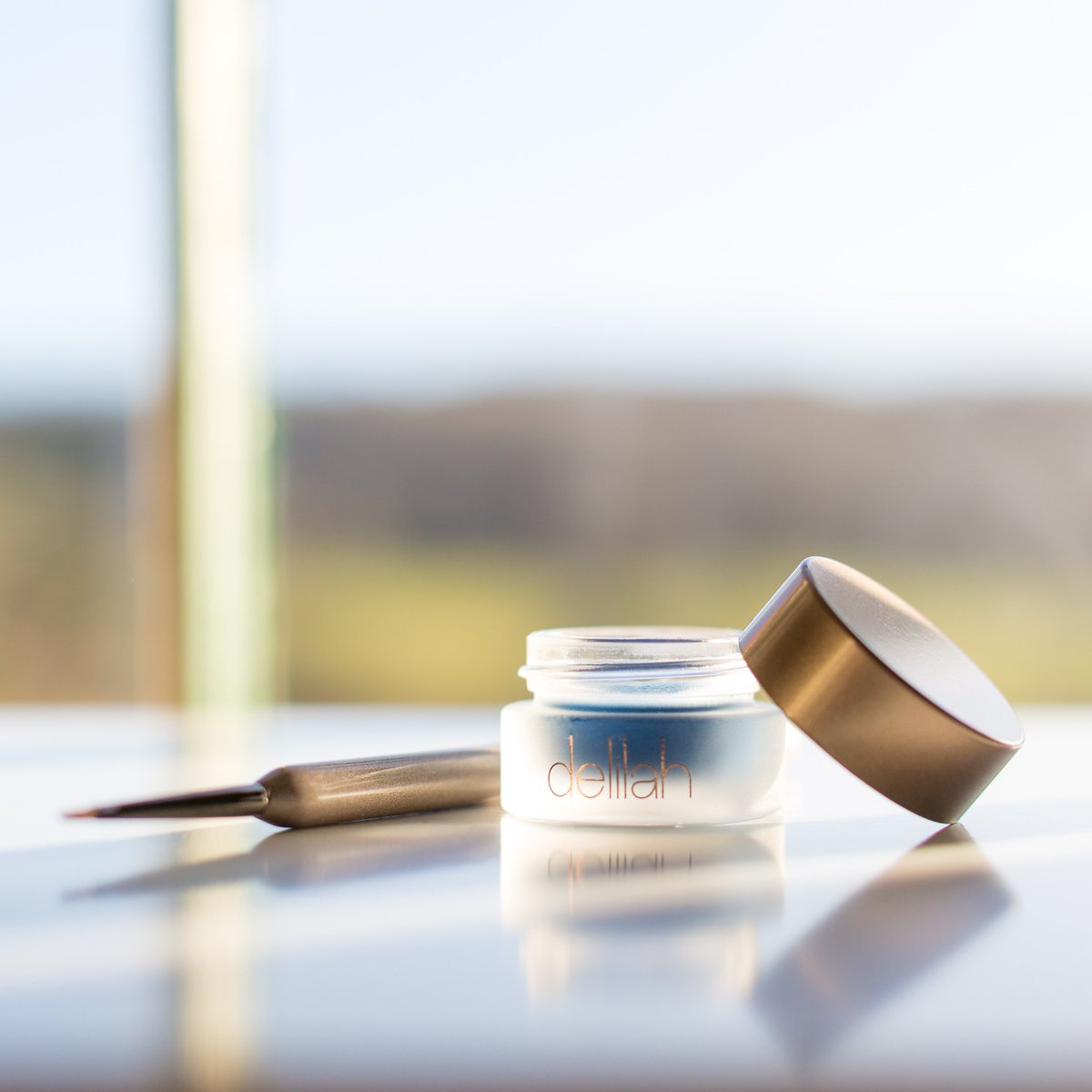 This beautiful glass pot of magic, lines the eyes with a vibrant, deep and precise line which is water-proof and smudge-resistant. For perfectly precise lines, use the delilah Small Liner Brush. Image credit: emmashervingtonphotography.com <a href="/delilahcosmetic/">delilahcosmetics</a> #vibranteyemakeup #delilah