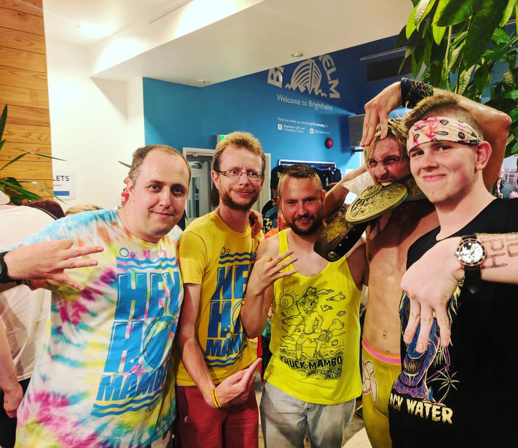 andyward1988's tweet photo. Noisybois (@BoisNoisy) (ft. Gadget) got our group picture with Mambo last night too after his big win! Well done Mambo we're so happy for you! #HeyHoMambo #Riptide #NoisyboisWrestleTees #AndysWrestlerTees https://t.co/eMgZdpQ8Ni