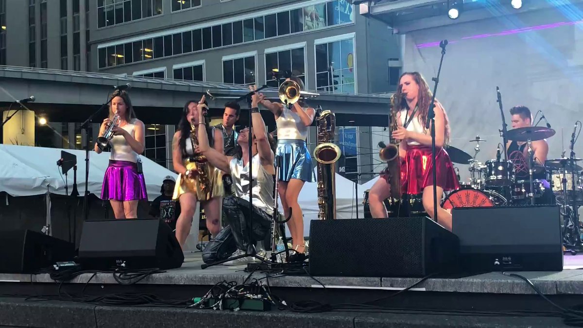theachromatics's tweet photo. Favourite shot from @chevroletindiefridays at @yongedundas. How to rock out in a soca tune! #livemusic #originalmusic #canadianmusic #musicianlife #livemusictoronto #yongedundassquare #hornplayers #sailormoon #cosplay #superhero #silvervest #latino #femalefronted #skirts https://t.co/gO2ucadEx7