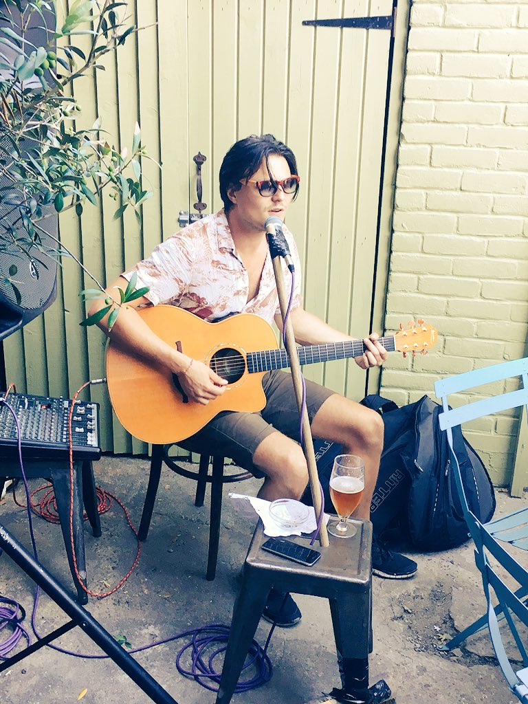 BeardyBeerBoy1's tweet photo. Enjoying the summer sun @goldfinchsw17 with Moses from @TaxiSpiritCo cooking a storm and @tomhannaymusic jamming in the garden #bbq #sundaybbq https://t.co/UhRyUv4Il4