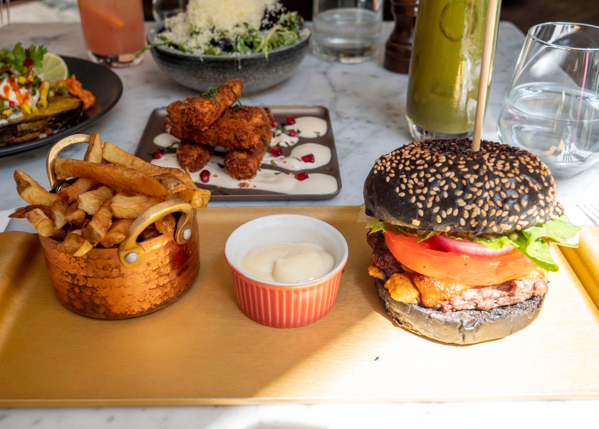 DealMakerPro's tweet photo. @LuxuryColumnist @DaisyGreenFood Sunday's should always start with Halloumi fries, b4 going onto Baked aubergine fritters, charcoal brioche bun + burger & a Matcha Latte.. YUM @DaisyGreenFood 🇦🇺🇬🇧#AussieBrunch https://t.co/4o4CSg5Vkp