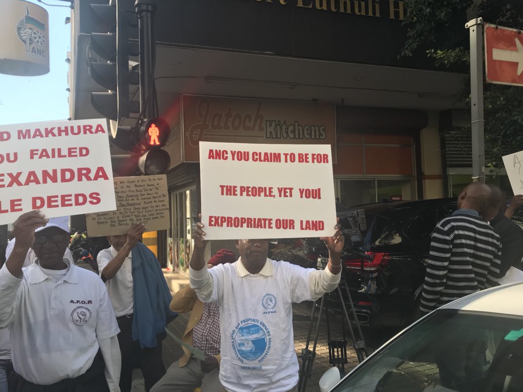 ewnreporter's tweet photo. #LandProtest A group of elderly people from the Alexandra Property Owner’s Rights and Association have staged a protest outside Luthuli House demanding land that they were forcibly removed from by the apartheid government back. TK https://t.co/cQVnoF9KeP