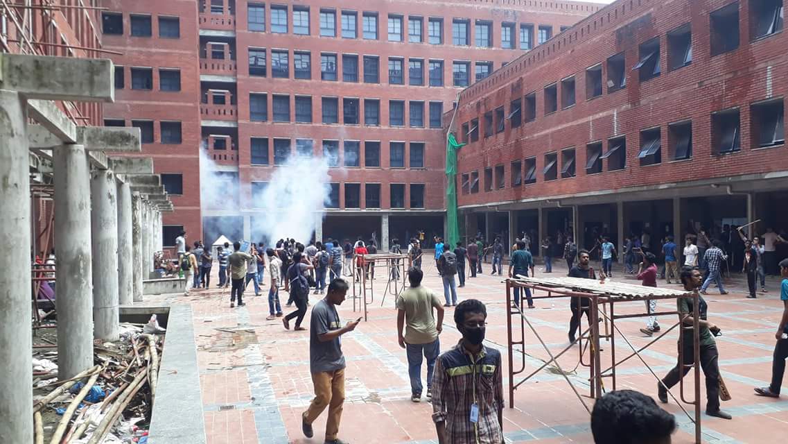 IslamTashik's tweet photo. Today morning East West University in Rampura were attacked by the police and BCL when the students were gathering for the protest. Police threw tear shells inside the campus. Whats happening to the country?
#roadsafetymovement
@AlJazeera @CNN @BBCWorld https://t.co/dedWQiy6Qw