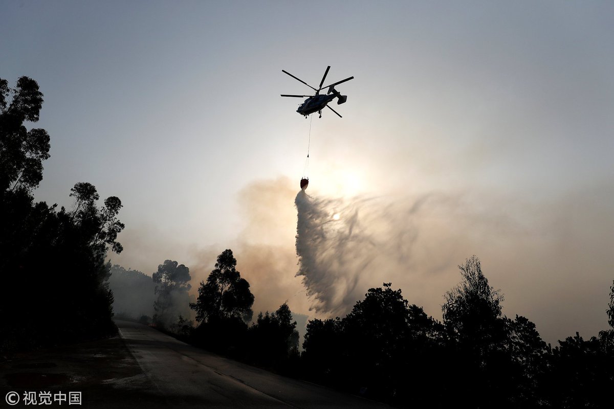 CGTNOfficial's tweet photo. Wildfire breaks out in #Monchique, Portugal. A rescue mission is underway. https://t.co/z7QQnWOFkN