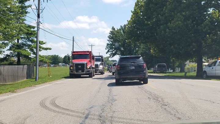 CenterGroveMag's tweet image. They're paving Stones Crossing Road. It's currently one lane just west of 135
