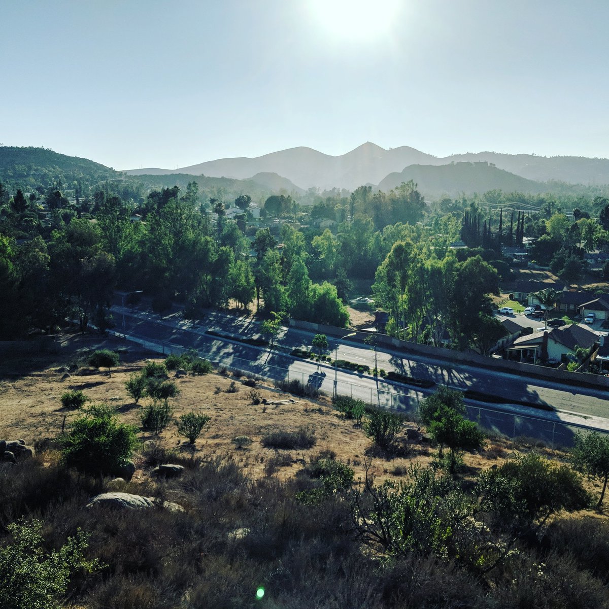 phillip_oriley's tweet photo. View of the background yesterday in Escondido working on the set of the TV pilot Chartered Directed by @AlwaysArob . #setlife #tvlife #tvpilot #filmlife #television #tv #crewlife #escondido #socal #sandiego #california #mountains #cinematography #film #charteredtv https://t.co/qTsLhZGBas