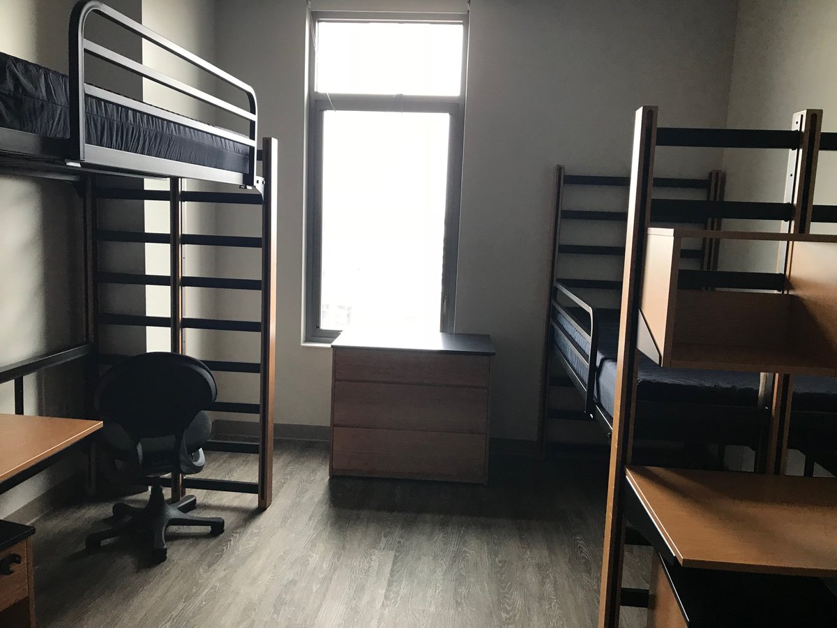 MUBusiness's tweet photo. Today a few #MUBiz faculty and staff had the opportunity to tour #WildCommons, the new freshmen/sophomore dorm on campus. We can't wait for students to move in at the end of the month! @MarquetteU https://t.co/KvCyllS1hf