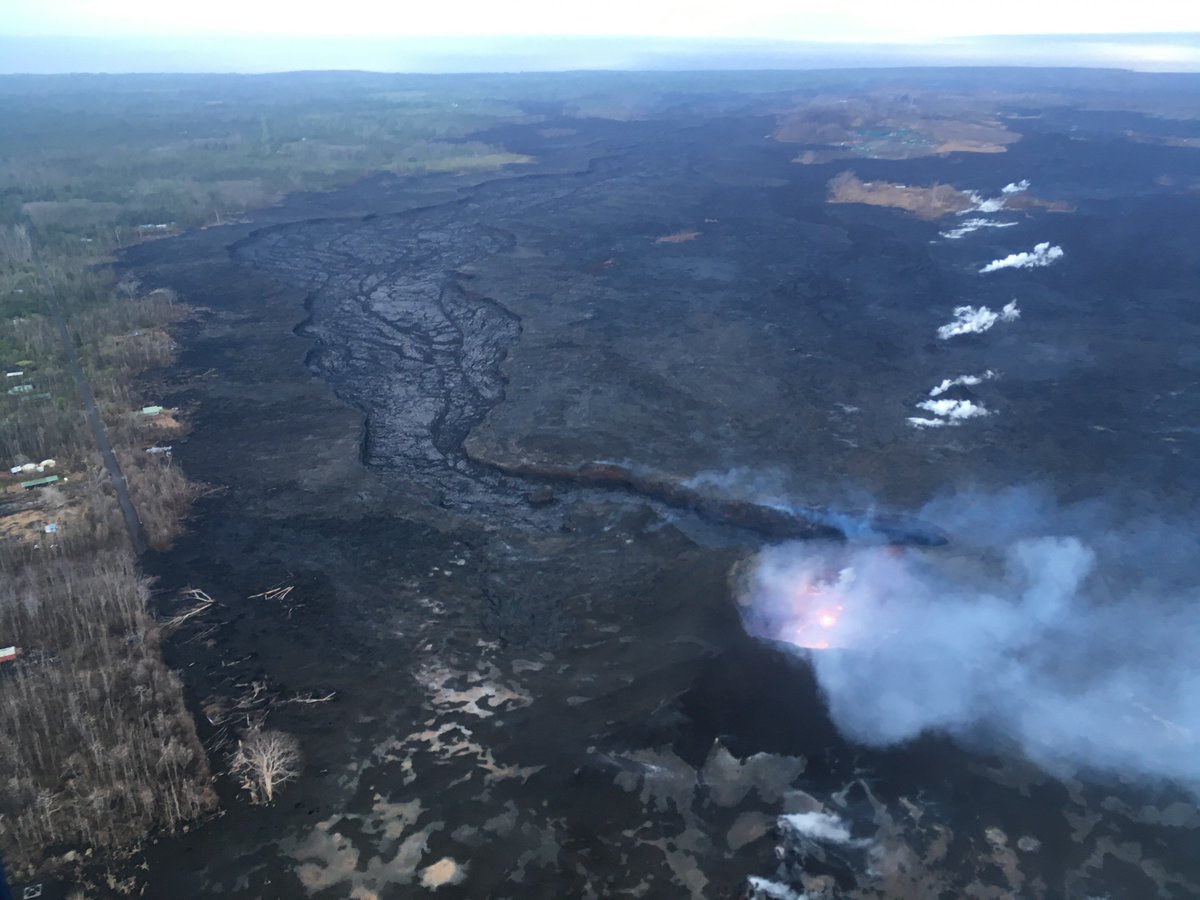 The August 6 morning overflight of Kilauea's lower East Rift Zone showed no visible supply of lava into the channel from fissure 8, and a weak to moderately active pond of lava bubbling in the cone. The perched channel and braided sections were all crusted with tiny bits of incandescence in cracks, and the first substantial area of active lava was just west of Kapoho crater.