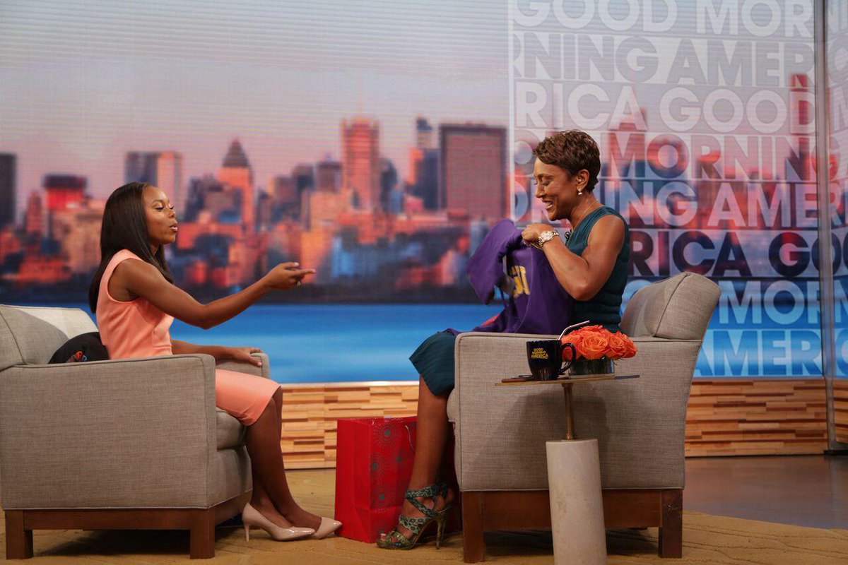 Kennedi Walker and Robin Roberts seated for an interview on a Good Morning America set.
