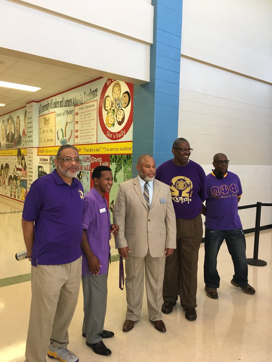 Dr_Douglas_CGHS's tweet photo. The men of Omega Psi Phi, KAA chapter came out to support the students, parents and staff of Flat Rock Elementary as they returned back to school. @DeKalbSchools @OMEGAPSIPHI https://t.co/lty7rUMXbc