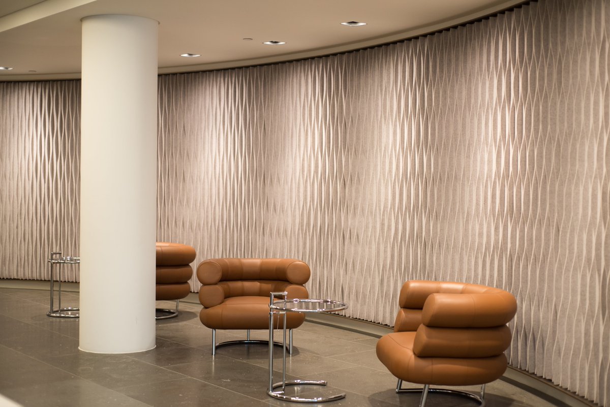Our striking Laine design on a curved wall within St James reception in central London, UK. #wallcovering #acoustic
