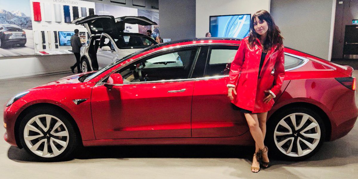 KFalcomer's tweet photo. @Tesla Who wouldn't love a new Tesla to match their Shiny Red PVC RainCoat? ;) Me! #DreamsDoComeTrue  hint hint @elonmusk ;) https://t.co/ssvw1tjjHt