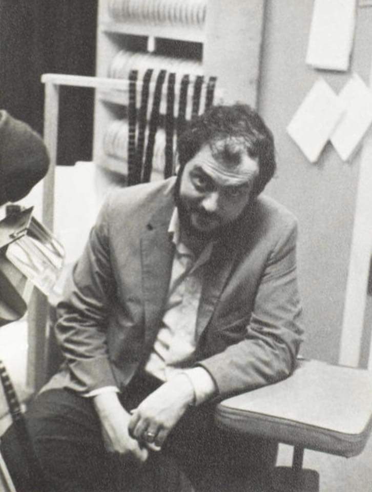 2001_italia's tweet photo. Today would have been #StanleyKubrick's 90th birthday. This is how I like to think he would stare at us, all busy celebrating it on the web. (It's actually a picture taken by David De Wilde during the editing of #2001ASpaceOdyssey) #2001at50 #StanleyKubrick90 #KubrickDay https://t.co/aA4HU9pKlX