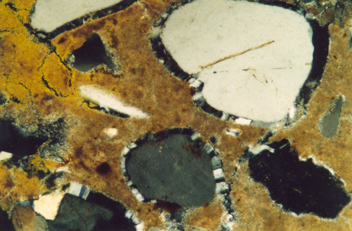 RSKPetrography's tweet photo. File this one under mortar degradation - sulfate attack. #petrography #mortaranalysis #ThinSectionThursday. https://t.co/W3MvJtAl9n