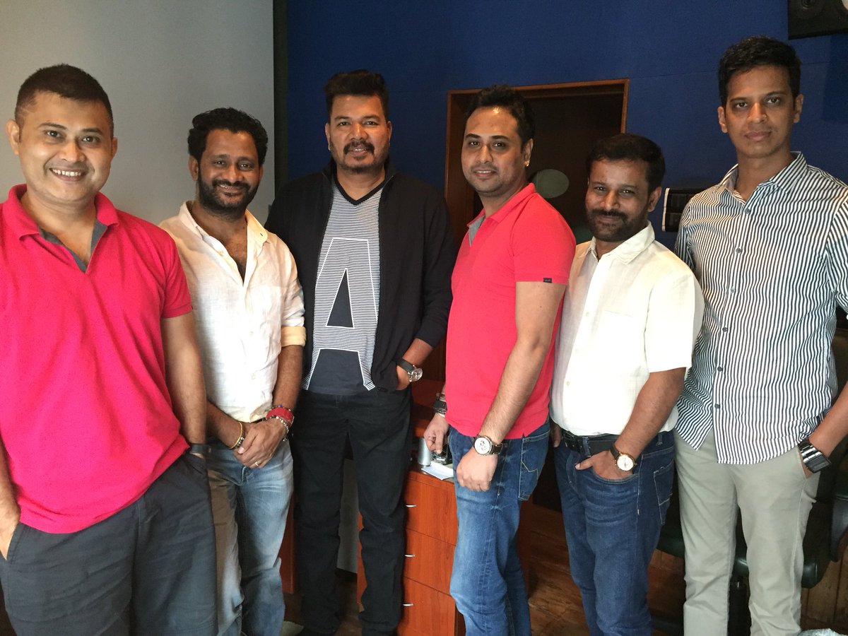 resulp's tweet image. Eight Years apart the first photo is during #Robot1 and second is today on #Robot2 - @2.O after our presentation of the first draft of Sound Design to @DirectorShankar. An excited team, happy faces with an air of creating something unorthodox!