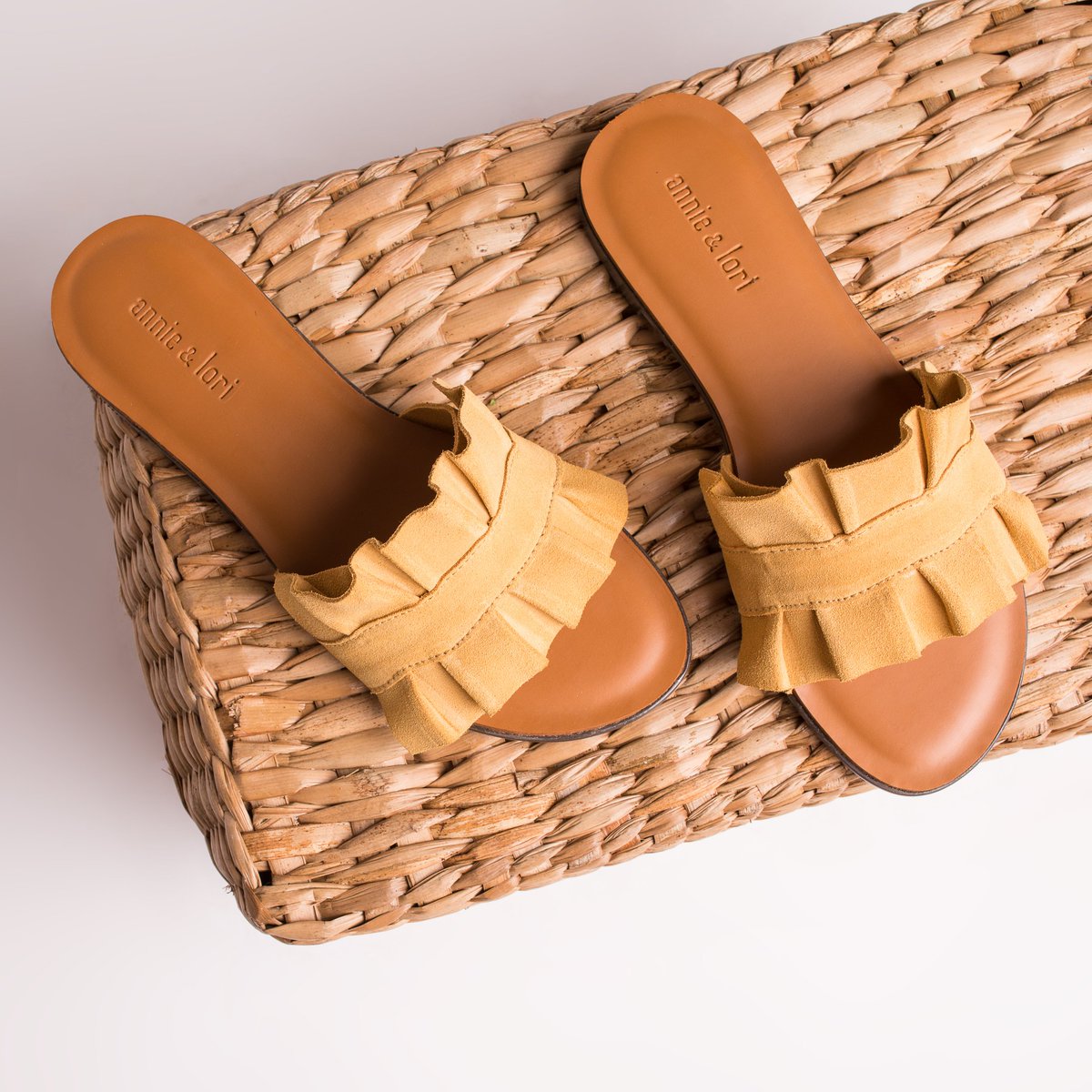 Introducing Irina -- our latest suede slip on with extra flair and comfort. Now available online and in stores. #AnnieAndLori #StayClassy #Yellow #suede