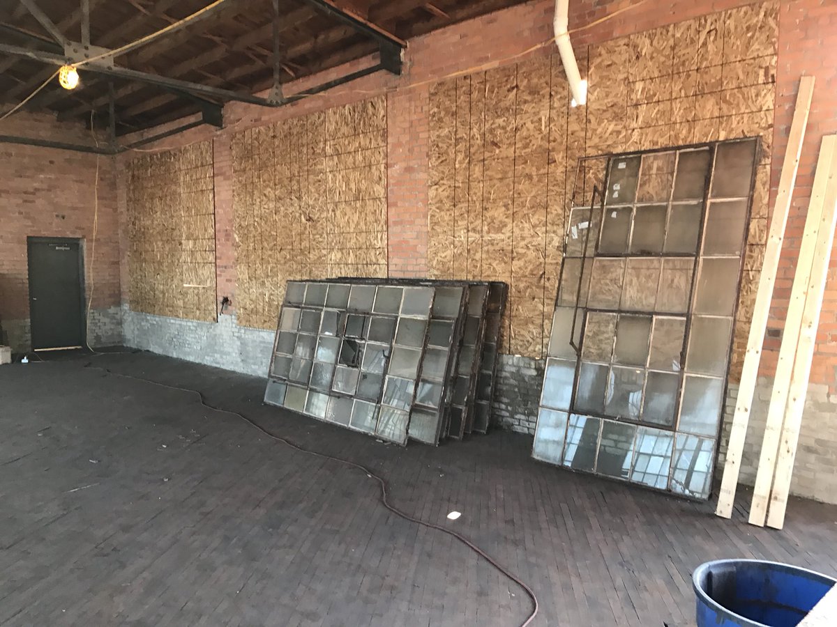 buhlsport's tweet photo. Glass panel installation almost complete! These office dividers are the actual windows that came out of the 3rd floor of @factorycorktown Swipe to go back in time! #detroit #corktown #factorywindows #reclaimed #powdercoating #powdercoat https://t.co/eaz3aRAzUg