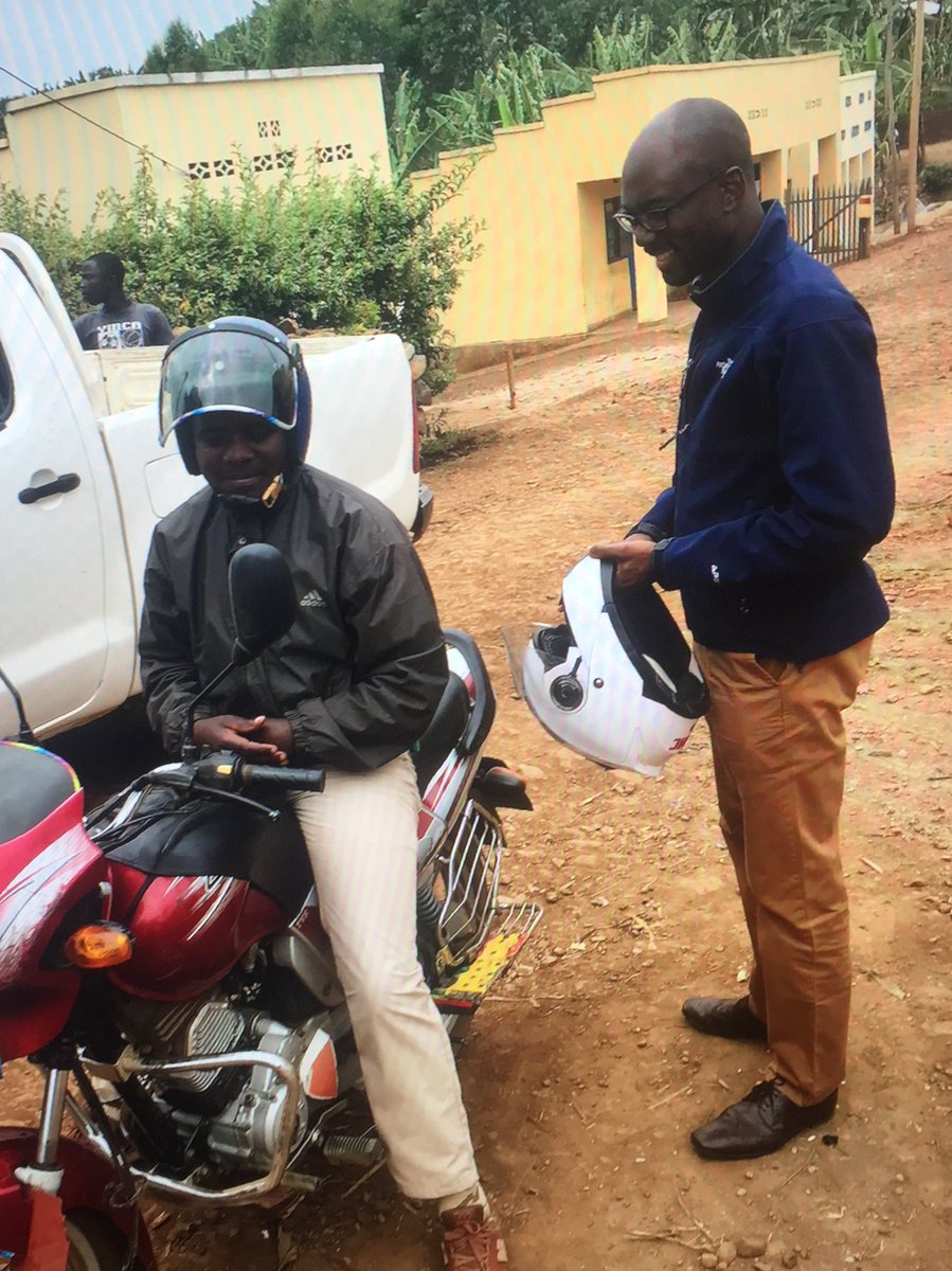 VSO_Rwanda's tweet photo. Our Country Director @PapaDioufVSO rides on a taxi motto, gets a feel of the volunteers’ field experience. This was today morning after a visit at EP Mwezi (Nyamasheke District) a school supported by our projects Building Learning Foundation, ‘Itegure Gusoma’ and ‘Itegure Kwiga’ https://t.co/LJJRlqEb8Q