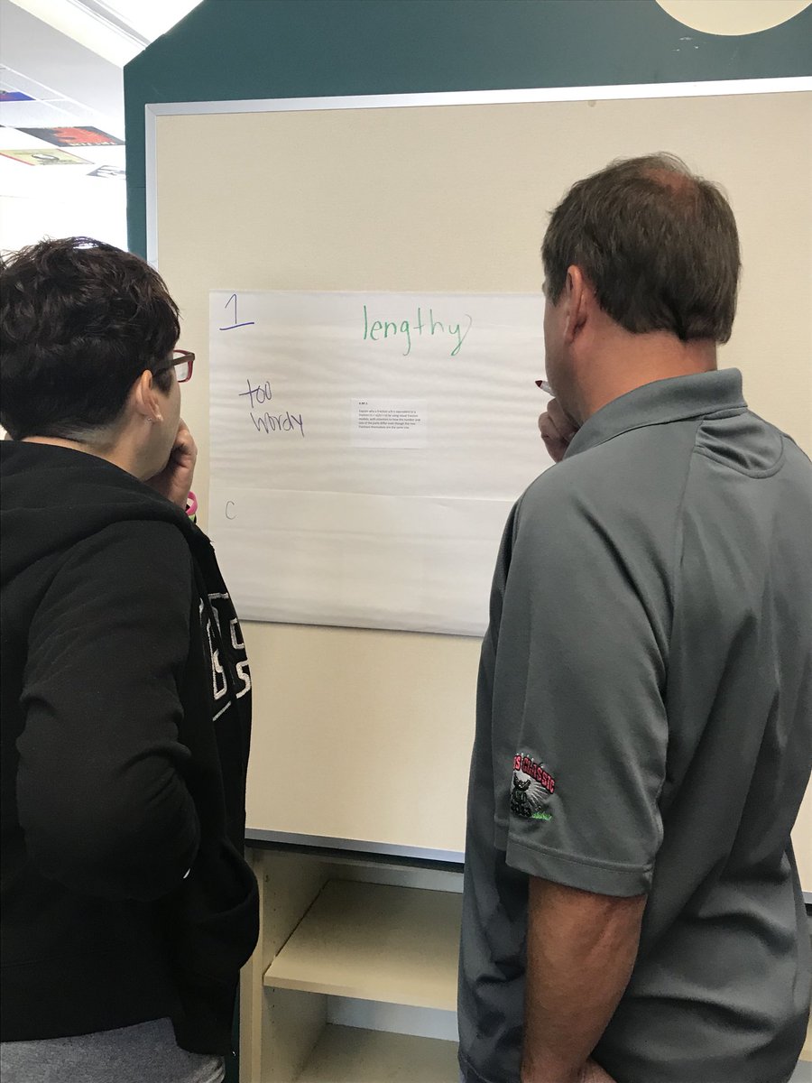 rockyriverelem's tweet photo. RRES teachers are doing hard work analyzing the math standards. #RRESSummerPD18 https://t.co/iF78HFXDYH