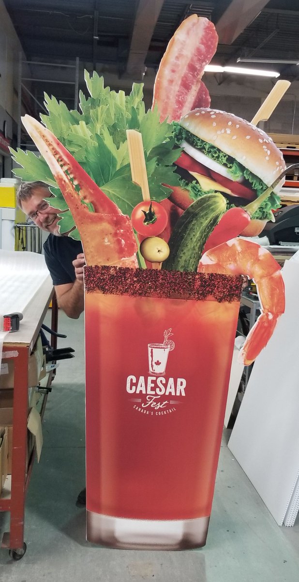AstleyGilbert's tweet photo. Who wants a Caesar? I DO! we recently printed a number of items for #CaesarFest held on July 22 including this GIANT 8 foot Mega Caesar. Im thirsty! #CaesarTheMoment @CaesarFest #WeAreAG #EventSignage https://t.co/4sJH5P0BOB