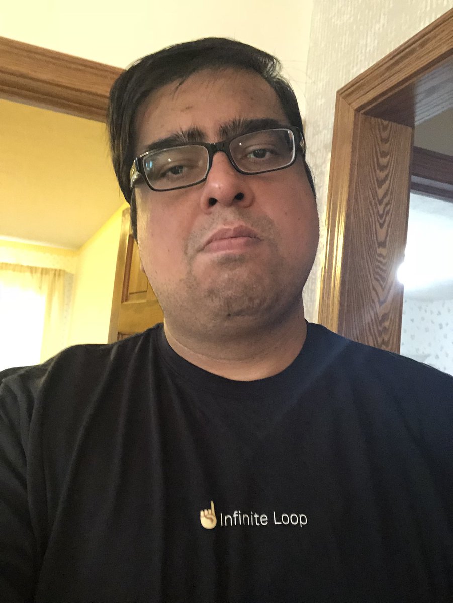 technosucks's tweet photo. Now that I put all of my Cavs gear that I have been wearing for the past two years away, I am dipping into my Apple gear. As you can see here, I am thrilled. #OneInfiniteLoop https://t.co/5hKtInCmCT