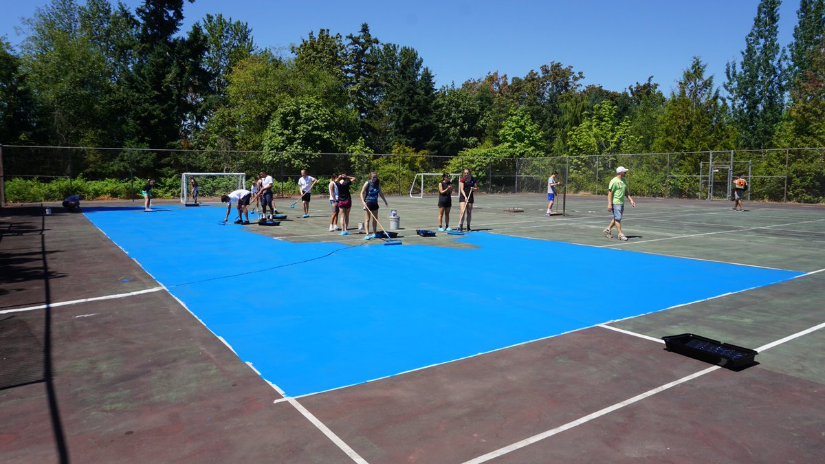 HighlineTBirds's tweet photo. More than 20 student athletes from #HighlineCollege's Men's Soccer, Women's Soccer and #UnifiedSports teams volunteered their time painting the unused tennis courts on campus today! The courts are being re-purposed into a place to practice soccer and are open to the community. https://t.co/IYzSw60hiB