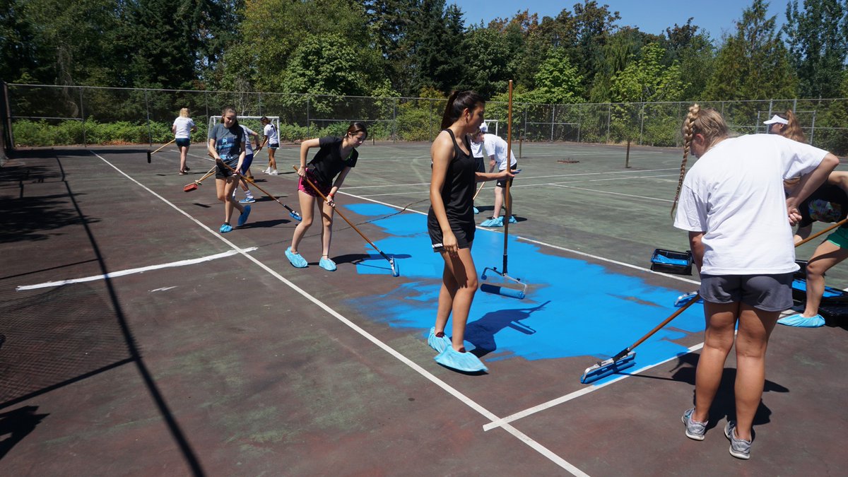 HighlineTBirds's tweet photo. More than 20 student athletes from #HighlineCollege's Men's Soccer, Women's Soccer and #UnifiedSports teams volunteered their time painting the unused tennis courts on campus today! The courts are being re-purposed into a place to practice soccer and are open to the community. https://t.co/IYzSw60hiB