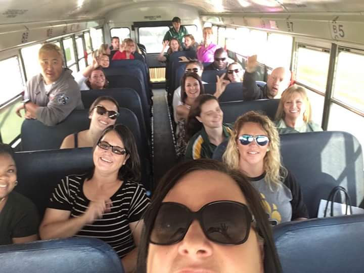 Teachers on a bus, oh my! Working as a community to know who we serve! #HOWL #thecoyoteway