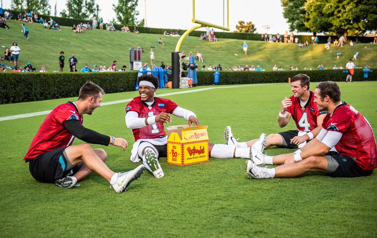 Panthers fan gives Cam Newton Bojangles during training camp / Twitter