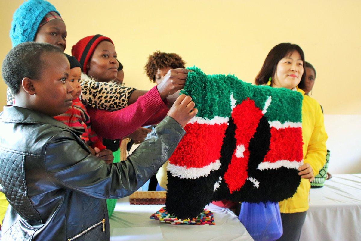 "Many hands make light work." These ladies from #Mukuru #slums give meaning to this saying as they sew this carpet of the #Kenyan flag together. They are among hundreds of teenage mums who we have supported to start small businesses. #WomenEmpowerment #WomeninBusiness #Carpets