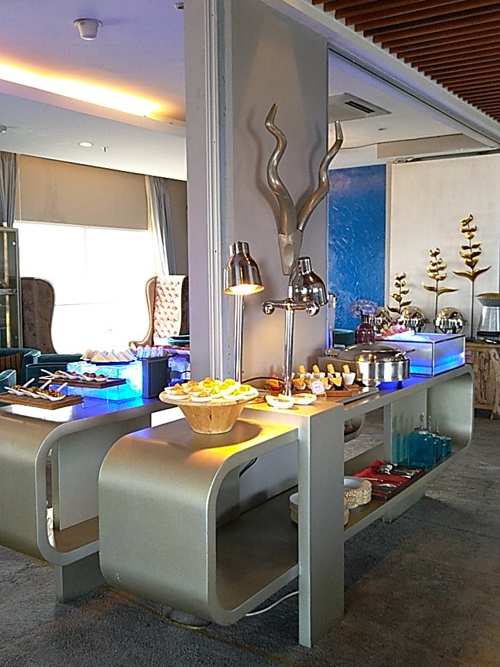 Enjoy high tea + at 33 degrees rooftop lounge and bar, Aston Marina Ancol.