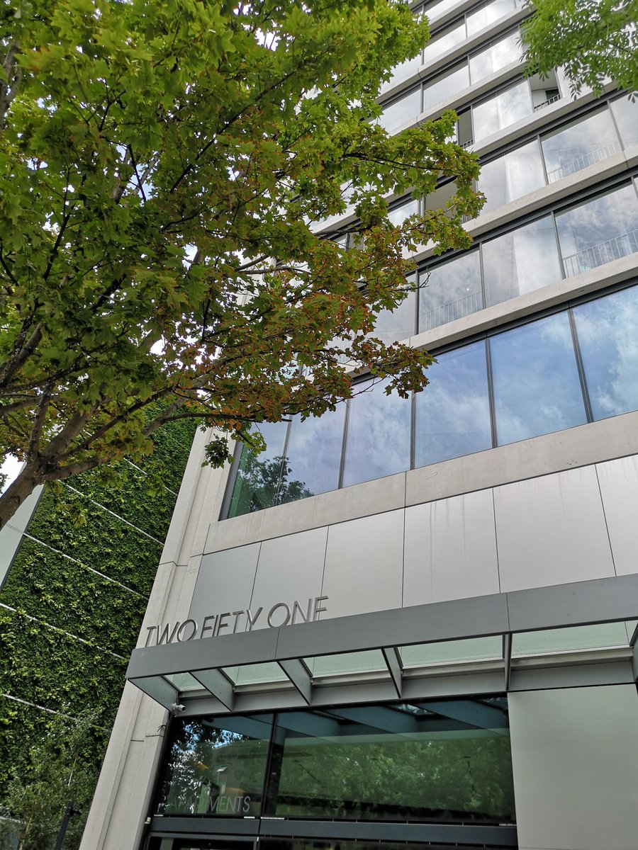 Laing_ORourke's tweet photo. The 27m-high living wall @TwoFityOneLDN is looking lusciously green during the #Londonheatwave - 36,000 plants from 11 different species were planted onto the 6-storey commercial building, adjacent to the latest striking 41-storey residential tower in Elephant and Castle. https://t.co/u8J3h9LF4z