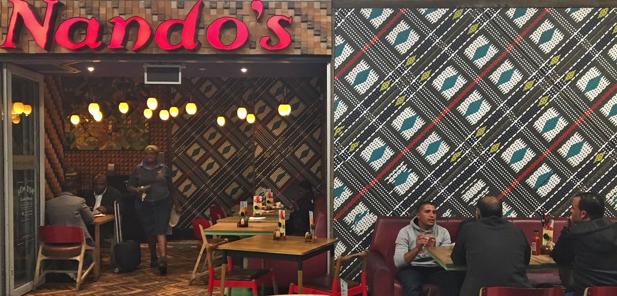 Spotted this fabulous traditional african beadwork inspired facade at Johannesburg airport. #ORTamboInternationalAirport #nandos #branding #capetown #SouthAfricanBrands