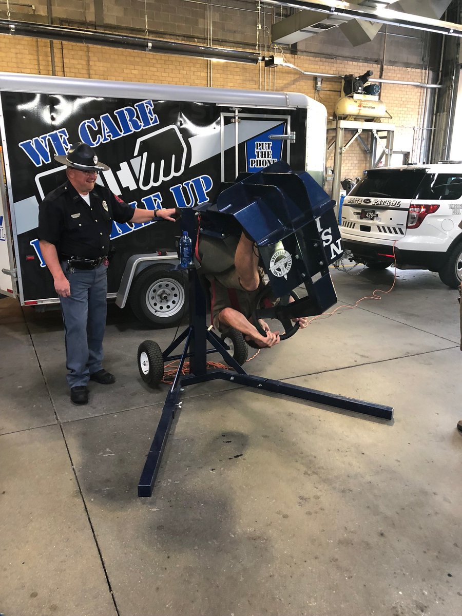 stuseverson's tweet photo. Omaha Driver Mike Gentry demonstrating seat belt safety in rollover simulator during safety demo in Berkshire and Elkhorn Valley Centers. Thank You Nebraska State Patrol for your help. https://t.co/WZeRjsOKcb
