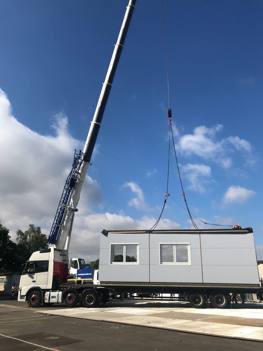 reds10ltd's tweet photo. In just 8 days we've excavated & poured over 60 foundation pads, carried out site enabling works, installed trackway & 29 bays of new #modular system. This will provide 9 new teaching spaces to @RugbyFreeSec. With a great team anything is possible. #TemporaryClassrooms #Modular https://t.co/KA272YGjis