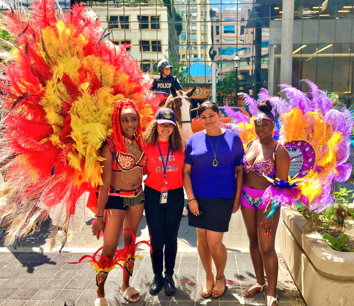 OfficerJen's tweet photo. Today @TorontoPolice HQ, the Toronto Caribbean Carnival kickoff. #caribbeanwave @TPS_CPEU @youthinpolicing https://t.co/91Yzaap0q7