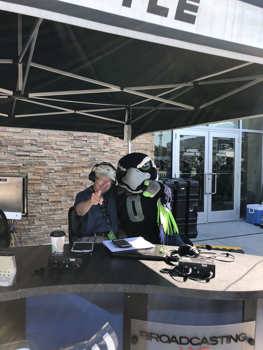 BlitzTheSeahawk's tweet photo. Day 2: Took some time out of the day to hangout with the one and only John “The Professor” Clayton. I did my best to answer all his questions but honestly I don’t think the radio gig works for me! #GoHawks #Day2inthebooks https://t.co/evUeWDtLnm