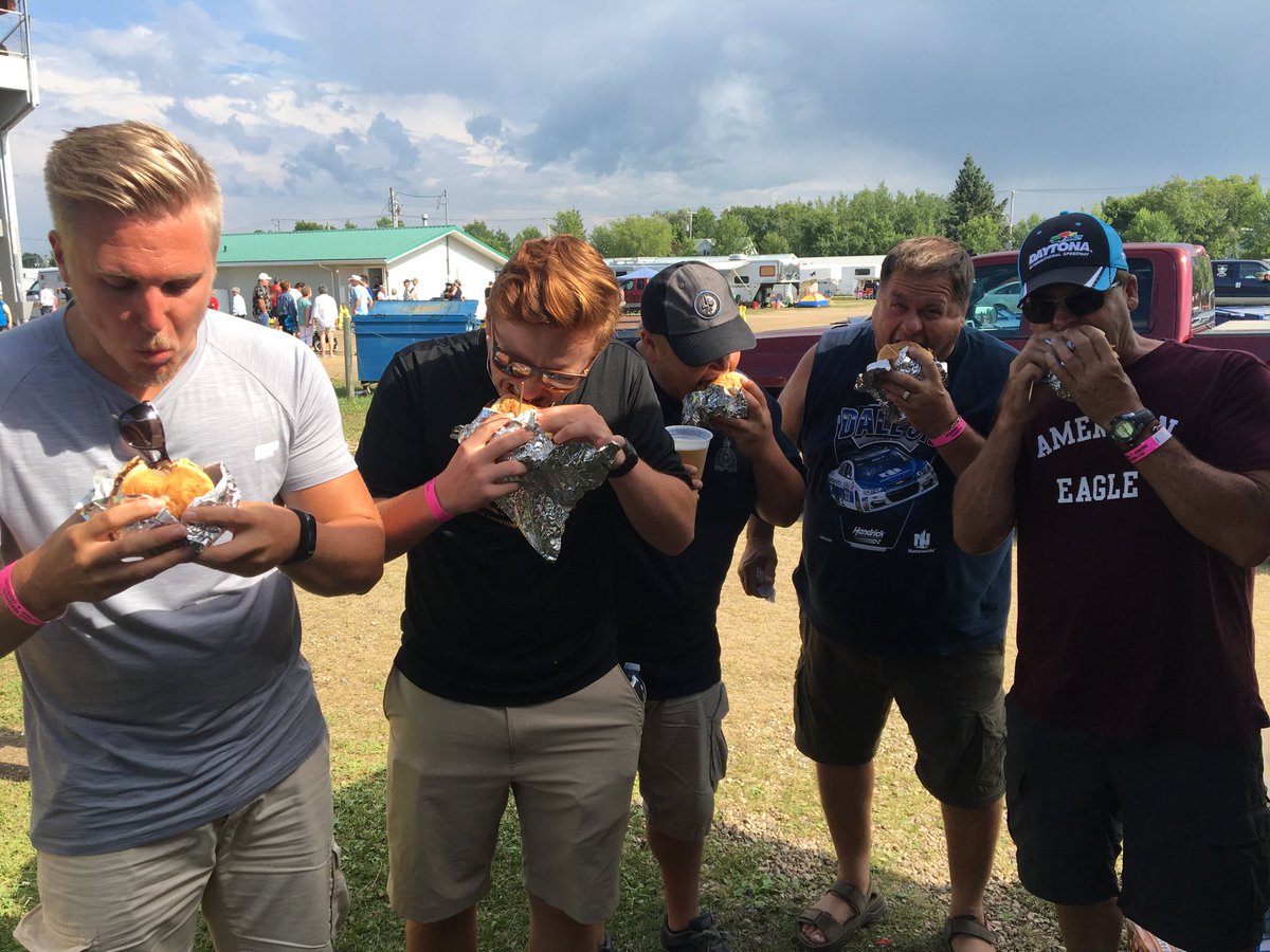 SwanKinsmen's tweet photo. You’ve heard of ⁦@FiveGuys⁩ burgers but here are 5 members of the Minitonas Mafia eating Kinsmen’s newest creation the “Fat Bastard”. Two beef patties, one chicken filet, 3 slices of cheese, 6 strips of bacon, and a couple onion rings on top. #ColonBlaster #BigKsDaddy https://t.co/EkDYzoncSt