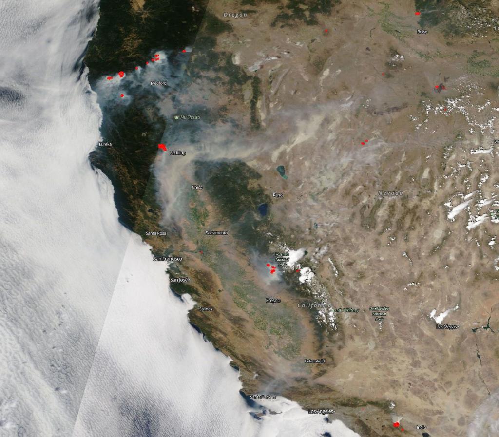 NASA's tweet photo. Fires on Earth, monitored from space. One of our @NASAEarth-observing satellites captured this image of the west coast of the United States showing the breadth of the fire issues plaguing that are of the country. Take a closer look: https://t.co/2b31c8jXPe https://t.co/ILEvrslRSp