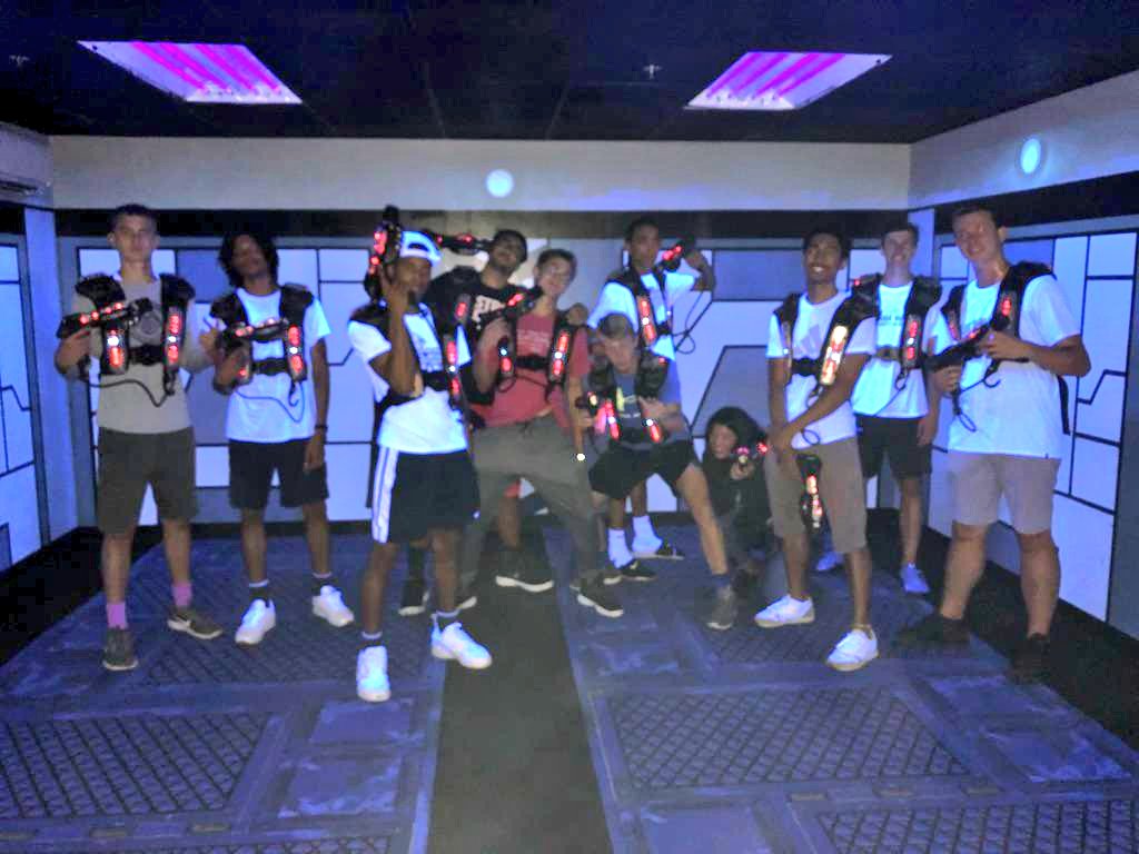 HoopGrindMICH's tweet photo. Our guys hit up LASER X in Fort Wayne! Over the years, this has become a tradition for our teams!
We 👀 you @coachb20, ducking down in the back, but with your Laser pointed up! 
Congrats Alex, a shooter on the court &amp; laser tag, on getting the win!
#GTST #HoopGrindFamily https://t.co/bkzcgJ5SfX