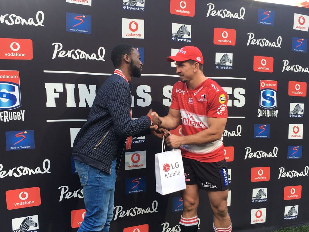 VodacomRugga's tweet photo. The smile can be seen from the other side of the stadium 😀 @Vodacom client Kutlwano Ngema experienced a game day like no other. VIP transport, Emirates Airline Park Suite tickets, handing over the Vodacom Man of the Match Award and a win! #RedExpectMore. https://t.co/uoli8ePbKW