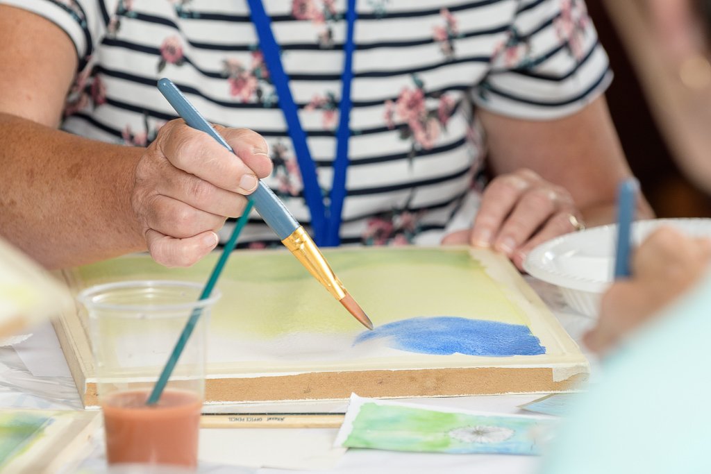 UK_COPS's tweet photo. Now that the COPS Kids are off having fun, our adult survivors have a chance to relax and join in some of the activities, including a watercolour class by fellow survivor @GLashmar  #COPS2018 #RebuildingShatteredLives https://t.co/Xp4DDqOwjk