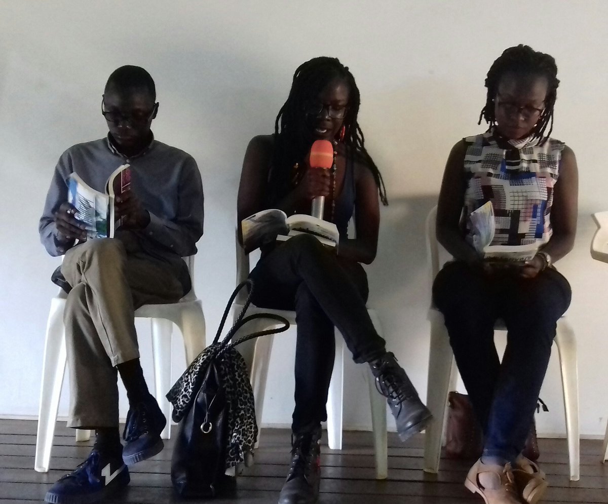 twongye's tweet photo. Writivism on stage at #FemriteLitWeek2018 Launch of The Uganda Book Market. Reading from Odokonyero. https://t.co/9up4lpJazT