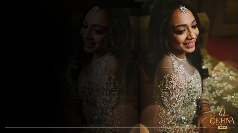 GehnaJewellers1's tweet photo. #PriyankaAgarwal looked ravishing adorning a #diamond #maangtikka and an #iridescent #palmcuff from Gehna for her special day. https://t.co/uwkML7IxpT