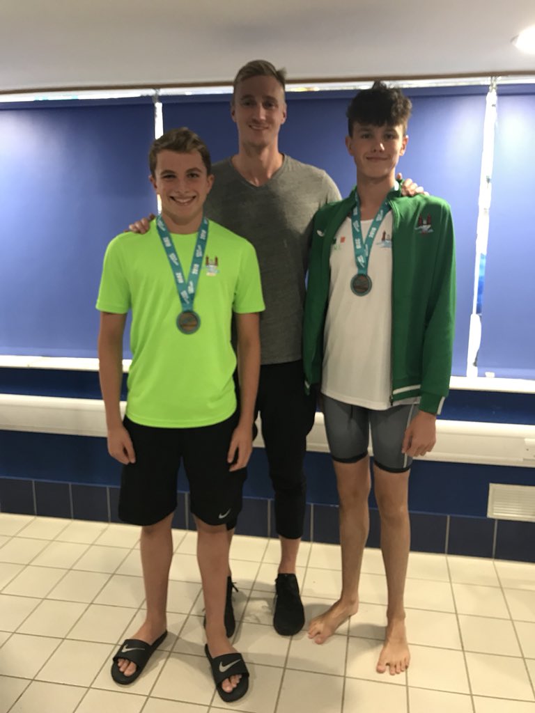 sundayswellsc's tweet photo. Let the good times roll and fall, Liam Custer Gold in #400fc and Neddie Irwin bronze in #400 fc #swscarmy. Pictured with Irish Olympian Shane Ryan #ISN18 @DeirdreESheehan @RichardCassid17 @SwimMunster https://t.co/1Xf9sQquBS