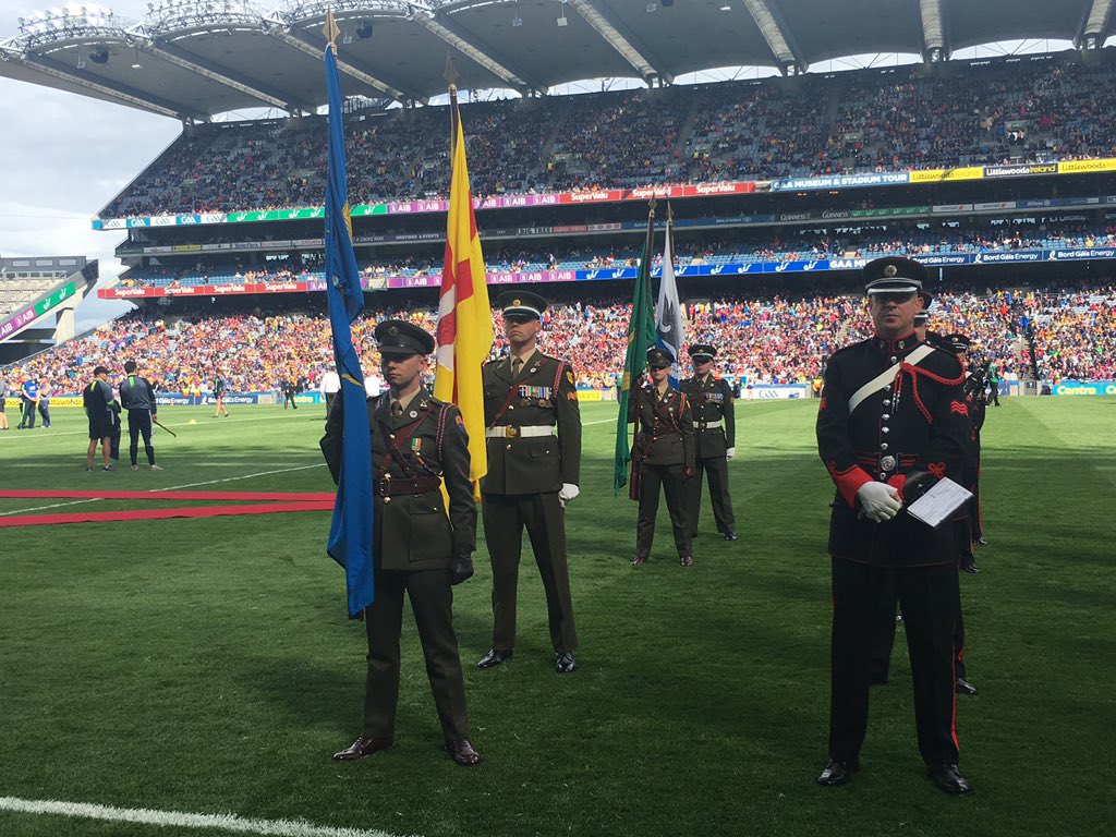 defenceforces's tweet photo. Defence Forces personnel carrying provincial and county flags for today's All-Ireland Hurling Semi-Final between Galway and Clare. @irishmissionun #óglaighnahéireann #strengthenthenation https://t.co/giuL0iTEDX