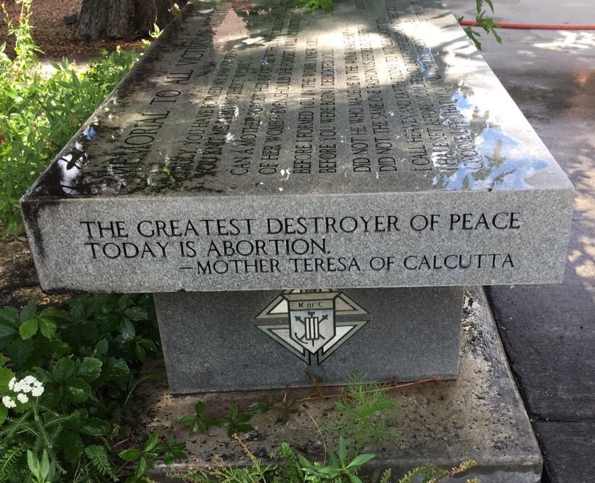 At a Los Alamos catholic church:This is from Mother Theresa’s Nobel Prize Acceptance Speech and is engraved on a bench in the ‘garden to victims of abortion’