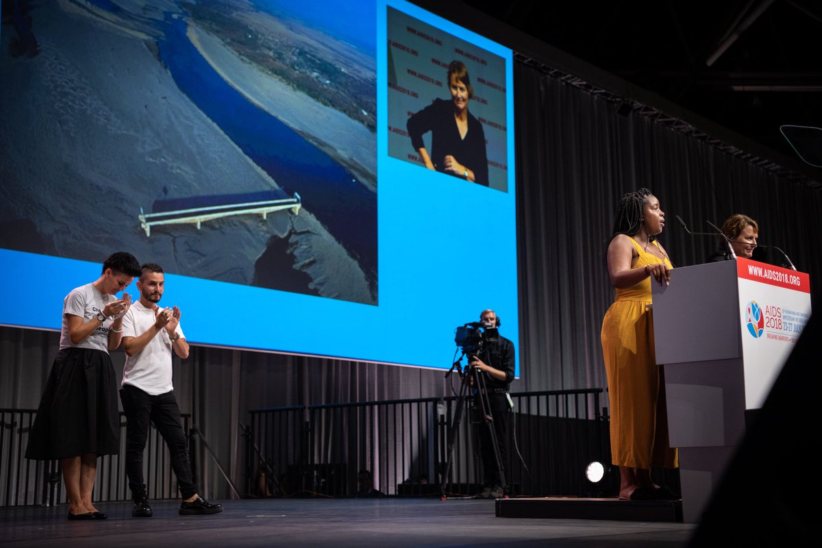 mercyshibemba's tweet photo. What. A. Week. 

From speaking at the #AIDS2018 Opening Ceremony, to interviewing HRH Prince Harry, Charlize Theron and Conchita to jetting home and getting engaged! 

♥️ https://t.co/mCBNJ4fsNS