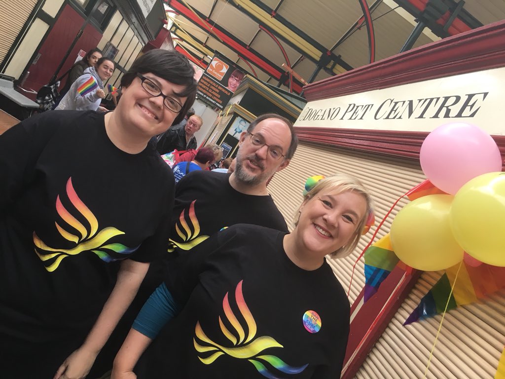 Claire, Richard and Lisa, all in rainbow Lib Dem t-shirts